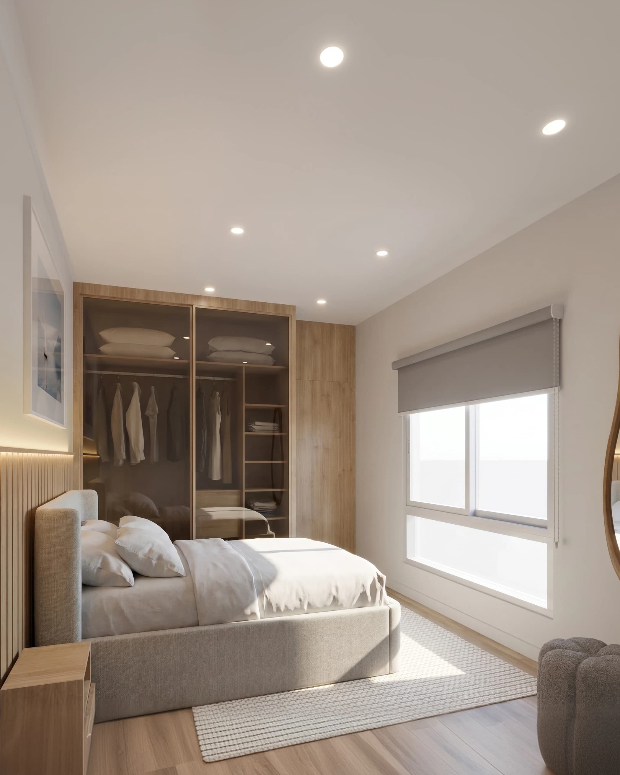 Suíte com cama de casal, armário com portas de vidro e janela ampla.
